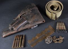 MILITARIA; LEATHER PISTOL HOLSTER WITH GUN CLEANING KIT ETC