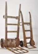 A PAIR OF VINTAGE RAILWAY SACK TRUCK TROLLIES