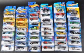 A LARGE COLLECTION OF APPROXIMATELY X50 CARDED MATTEL MADE HOT WHEELS