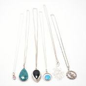 ASSORTMENT OF SILVER PENDANT NECKLACES