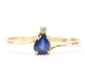 GOLD DIAMOND & SAPPHIRE CROSSOVER RING