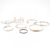 GROUP OF SILVER BANGLE BRACELETS