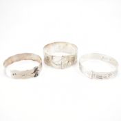 THREE SILVER BANGLE BRACELETS