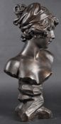 FAUX BRONZE BUST DEPICTING A YOUNG WOMAN