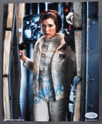 CARRIE FISHER (1956-2016) - STAR WARS - AUTOGRAPHED 8X10