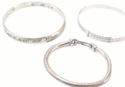THREE VINTAGE SILVER BRACELETS