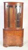 A 20TH CENTURY GEORGE III STYLE CORNER DISPLAY CABINET