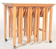 1960S TEAK DROP LEAF NEST OF TABLES