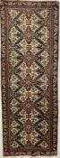 AN EARLY 20TH CENTURY PERSIAN ISLAMIC HERIZ RUNNER FLOOR RUG