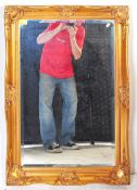 CONTEMPORARY GILT FRAMED WALL MIRROR