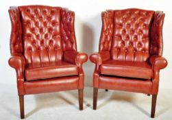 TWO 20TH CENTURY TAN LEATHER WINGBACK ARMCHAIRS