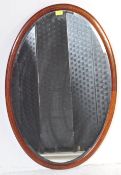 EDWARDIAN MAHOGANY OVAL WALL MIRROR