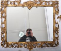 20TH CENTURY GILTWOOD FRAMED HANGING MIRROR