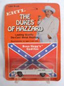 THE DUKES OF HAZZARD - ERTL - DIECAST BOSS HOGG'S CADILLAC