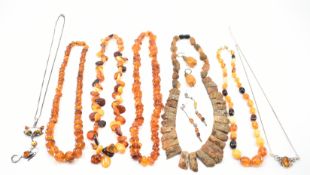 ASSORTMENT OF SILVER & AMBER JEWELLERY