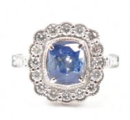18CT WHITE GOLD SAPPHIRE & DIAMOND HALO RING