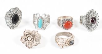 COLLECTION OF 925 SILVER PUNCHED DESIGN RINGS.