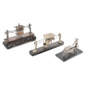 GROUP OF CHINESE SILVER FIGURINES