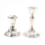 TWO SILVER FILLED CANDLESTICKS