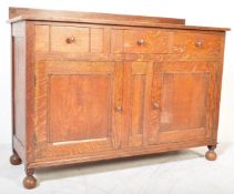 1920'S SOLID OAK COTSWOLD SCHOOL SIDEBOARD CREDENZA