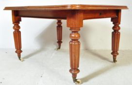 EARLY VICTORIAN MAHOGANY TWIN LEAF EXTENDING DINING TABLE