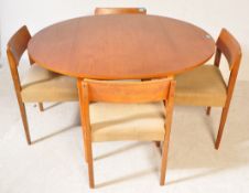 MID 20TH CENTURY TEAK DINING TABLE W/ FOUR CHAIRS