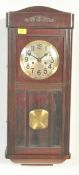 EARLY 20TH CENTURY MAHOGANY CASED WALL CLOCK