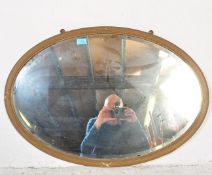 VINTAGE OVAL GILT WALL HANGING MIRROR