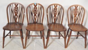 FOUR VINTAGE ERCOL FLEUR-DE-LYS DINING CHAIRS