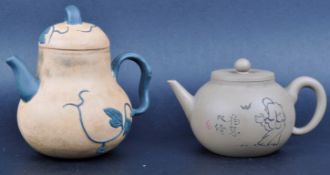 TWO EARLY 20TH CENTURY CHINESE YIXING TEAPOTS