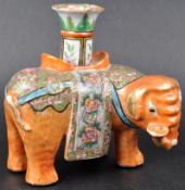 19TH CENTURY CHINESE FAMILLE ROSE ELEPHANT CANDLESTICK