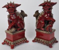 PAIR OF ORIENTAL CERAMIC TEMPLE / FU DOGS