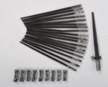 TEN PAIRS OF ABALONE SHELL CHOP STICKS W/ HOLDERS