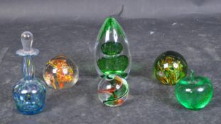 A COLLECTION OF GLASS PAPERWEIGHTS