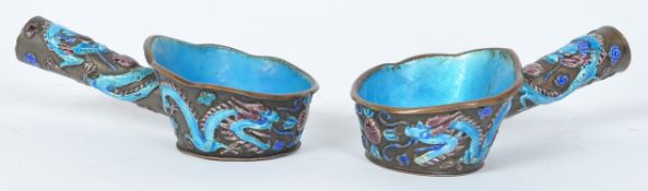 PAIR OF 1920S ENAMELLED COPPER CHINESE SILK IRONS