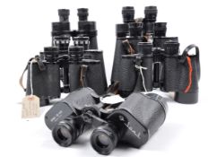 A COLLECTION OF ASSORTED VINTAGE BINOCULARS