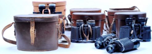 COLLECTION OF ASSORTED CASED VINTAGE BINOCULARS
