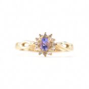 GOLD TANZANITE & DIAMOND CLUSTER RING