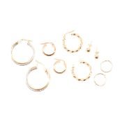 Two pairs of 9ct gold earrings. The earrings to include hallmarked  bi colour hoop and twisted hoop.