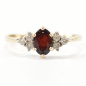 HALLMARKED 9CT GOLD GARNET & WHITE STONE RING