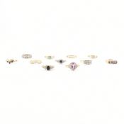 COLLECTION OF GOLD ON SILVER GEM SET RINGS