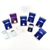 COLLECTION OF SILVER PENDANT NECKLACES