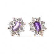 PAIR OF 9CT GOLD AMETHYST HALO STUD EARRINGS