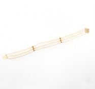 14CT GOLD & PEARL THREE STRAND BRACELET
