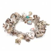 VINTAGE SILVER HALLMARKED CHARM BRACELET