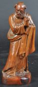 EARLY 20TH CENTURY FRUITWOOD CARVED RELIGIOUS FIGURINE