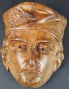 19TH CENTURY CARVED WALNUT RELIGIOUS WALL MASK