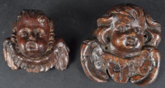 PAIR OF 19TH CENTURY CARVED OAK CHERUB FACE MASKS