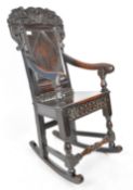 17TH CENTURY CARVED OAK ROCKING CHAIR