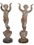 PAIR OF EARLY 20TH CENTUTY CAST IRON GARDEN STATUES